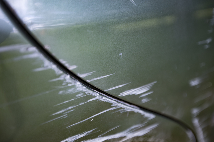 scratched-car -in- alaska